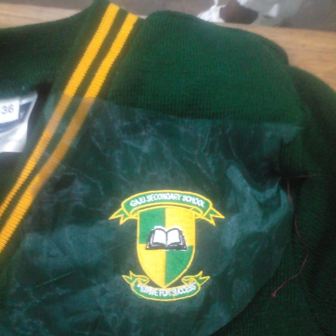 Green and yellow Guju Secondary School jacket